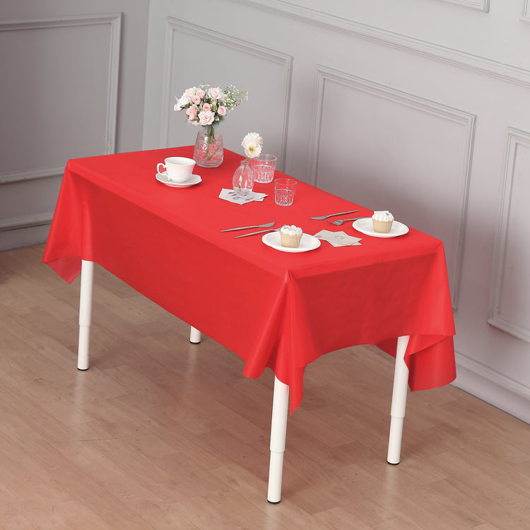 red plastic table cover roll
