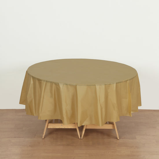 round gold plastic table cover