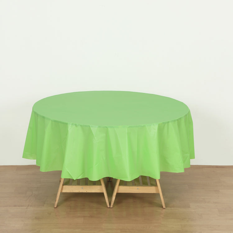 round apple green plastic table cover